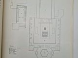 an open book with a drawing of a building on it