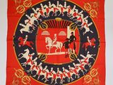 une image représentant une écharpe rouge et bleue sur laquelle figure un homme à cheval