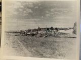 a black and white photo of an old photo of a farm