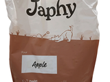 a bag of dog food that is sitting on the ground