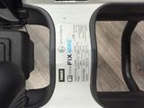 a close up view of a remote control in a car