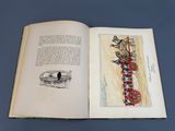 an open book with a picture of a man riding a horse