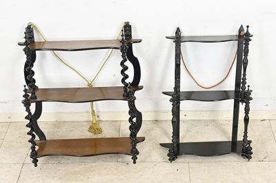 two shelves that have rope on them in a room