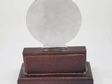 wooden stand with a mirror on top of it on a white background