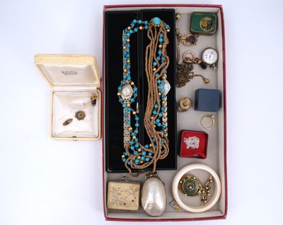 a box of jewelry that is sitting on a table