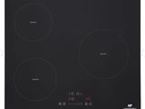 a black induction cooktop with four burners and a timer