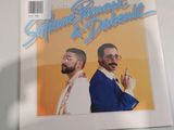 a picture of a picture of two men on the cover of a magazine