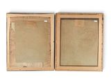 two wooden frames with a picture of a man and a woman on them