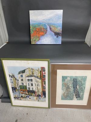 three framed paintings of a city street with buildings and a river