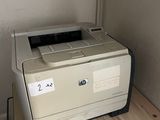 a printer that is sitting on top of a box