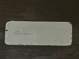 a picture of a piece of paper that has a name tag on it