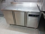 a stainless steel counter in a commercial kitchen