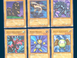 four different pokemon cards are shown on a blue background