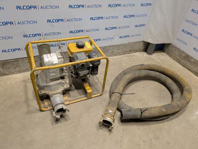 an image of a machine with a hose next to it