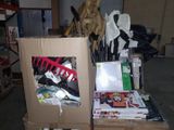 a cardboard box sitting on top of a carton filled with assorted items