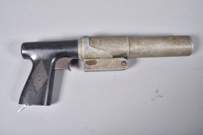 a gun that is sitting on a table