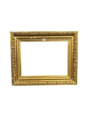 a gold picture frame on a white background