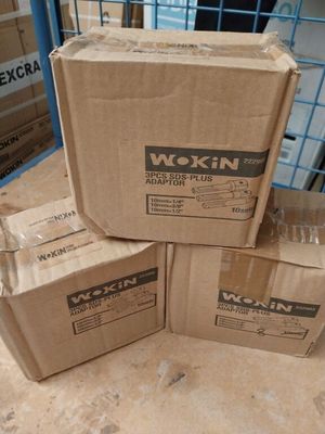 three boxes stacked on top of each other on top of a table