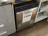 a kitchen with a sink, dishwasher, and a dishwasher