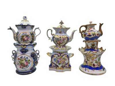 three different types of porcelain teapots are shown on a white background