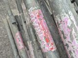 a lot of pipes that have been painted pink on them