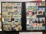a book with a bunch of stamps on it