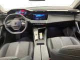 the interior of a car with a steering wheel, dashboard, and dashboard lights