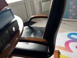 a chair that is sitting in front of a desk