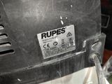 a close up of a metal object with a sticker on it