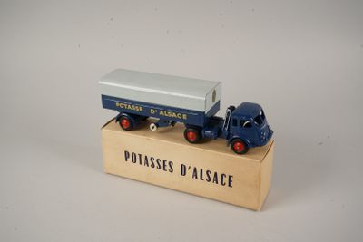 a toy truck that is sitting on top of a box
