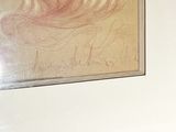 a picture of a painting of a woman on a wall