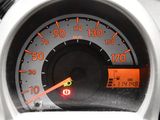 a close up of a speedometer in a car