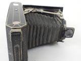 an old camera that is sitting on a table