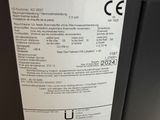 a close up of a label on the back of a machine