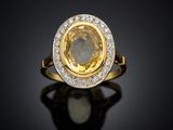 a yellow sapphire and diamond ring