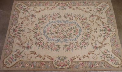 an image of a rug with a floral design on it