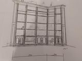 drawing of a room with a book shelf and a window