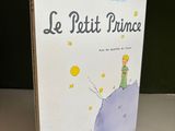french children ' s book, le petit prince, written by antoine de saint - exupre