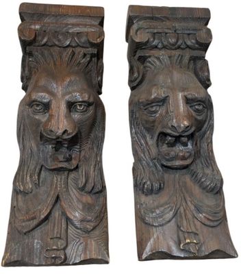 pair of carved wood lion head bookends