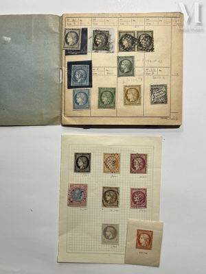 two books with stamps on them sitting on top of a table