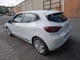 a picture of a white car parked in a parking lot