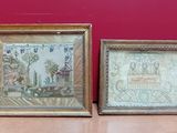 deux tableaux encadrés posés sur une table en bois