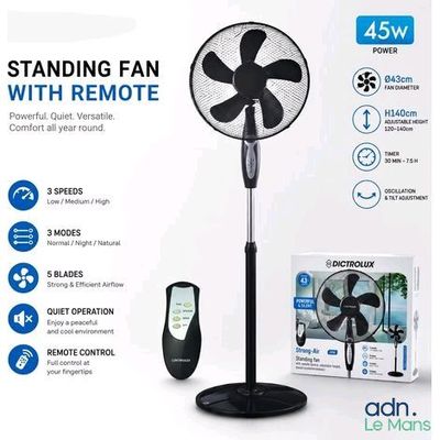 an image of a stand fan with remote control in front of a box