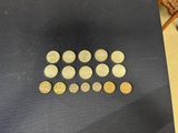 a close up of a table with a bunch of coins on it