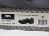 a box of shoes that are on a table