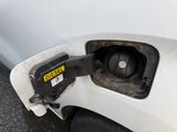 a gas pump that is attached to the side of a car