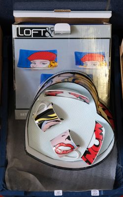 a suitcase with a hat and other items inside of it