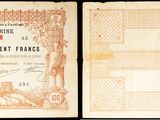 un vieux document sur lequel figure la photo d'un homme