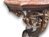 a table with a marble top on a white background