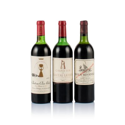 three bottles of wine sitting next to each other on a white surface